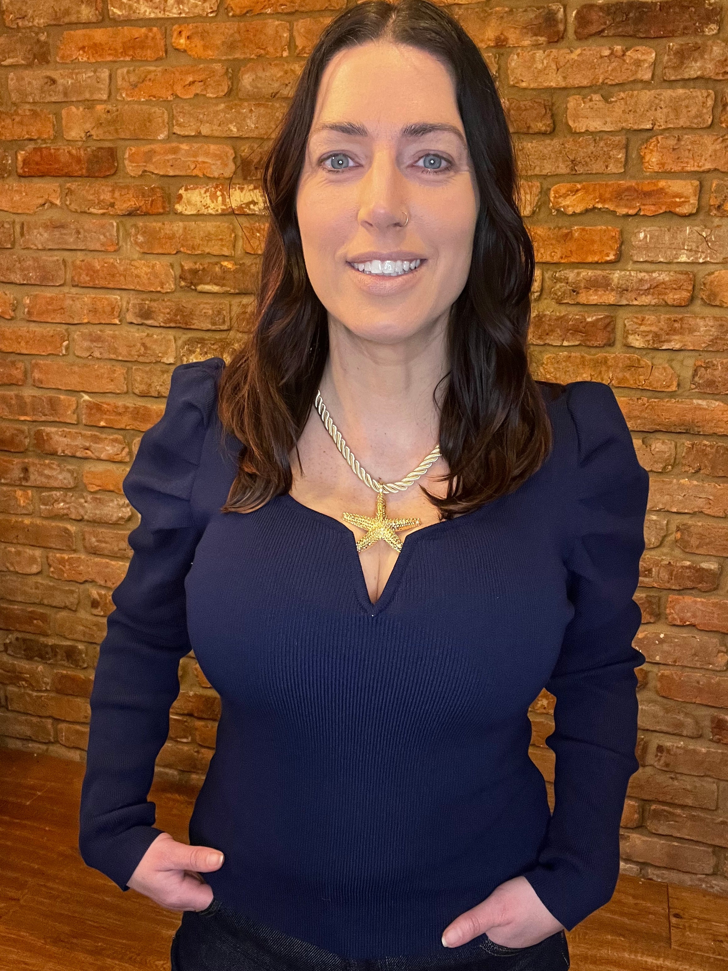 Navy v neckline ruched long sleeved top