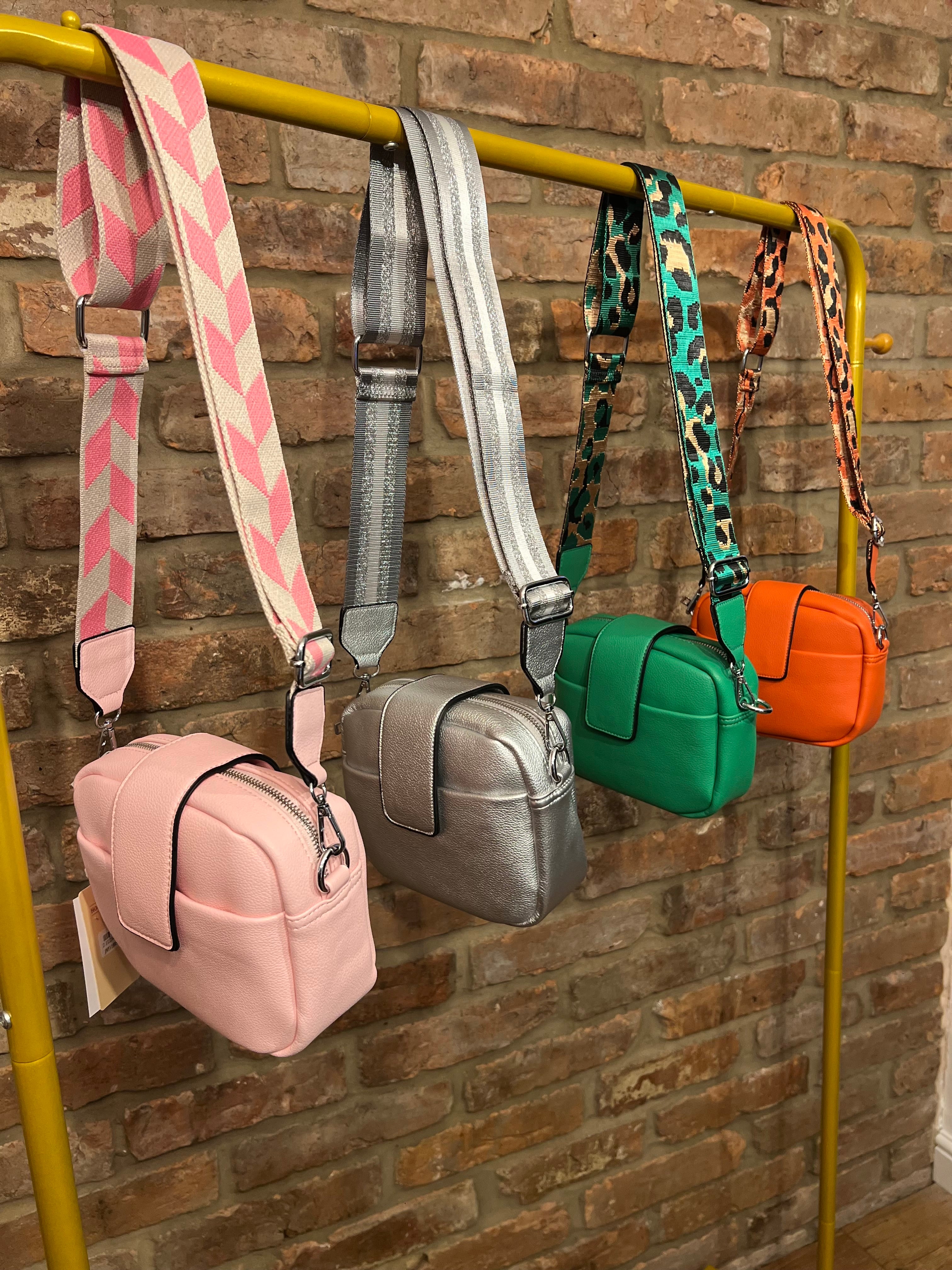 Crossbody handbags with matching straps