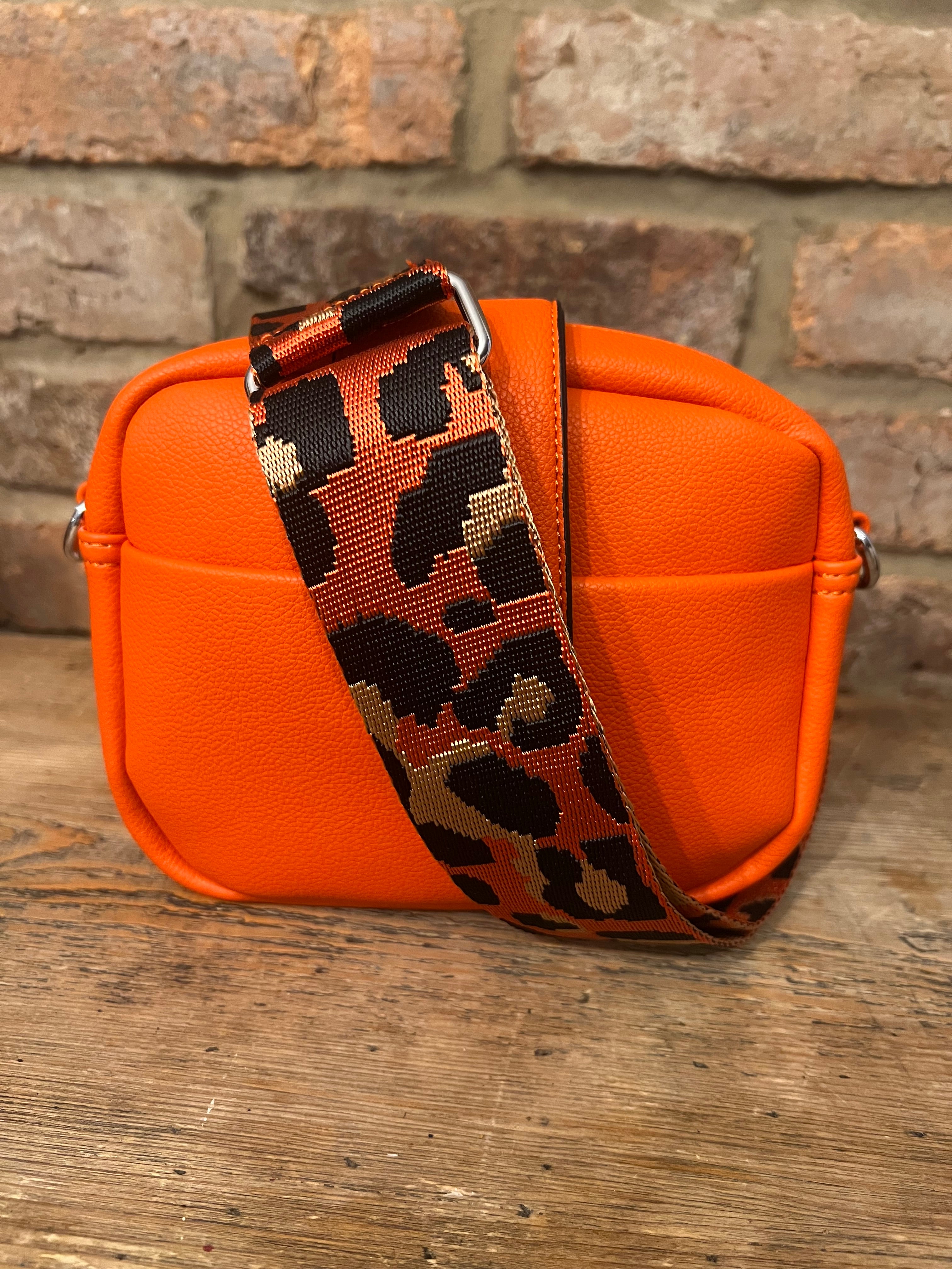 Crossbody handbags with matching straps