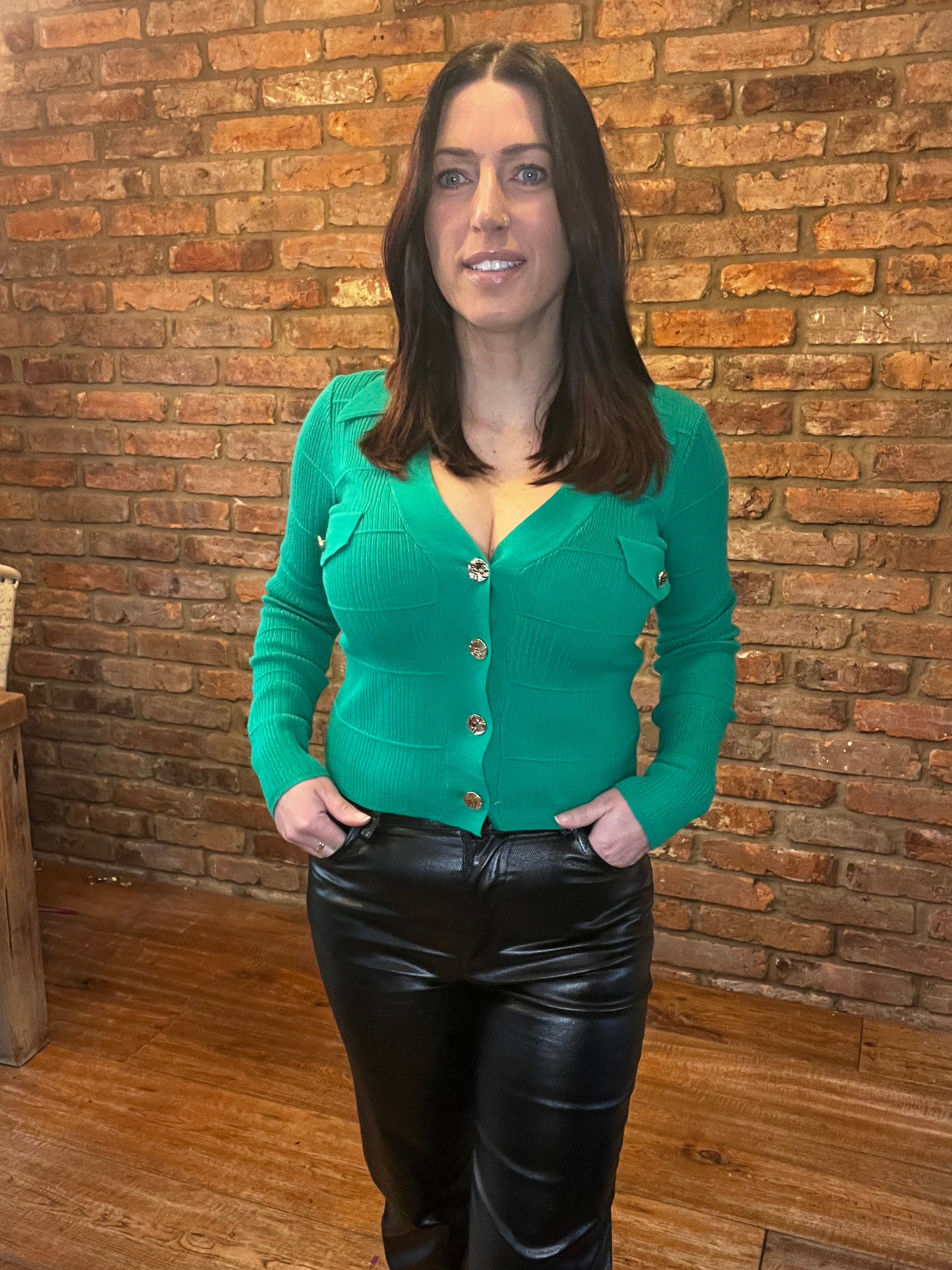 Green long sleeved gold button top