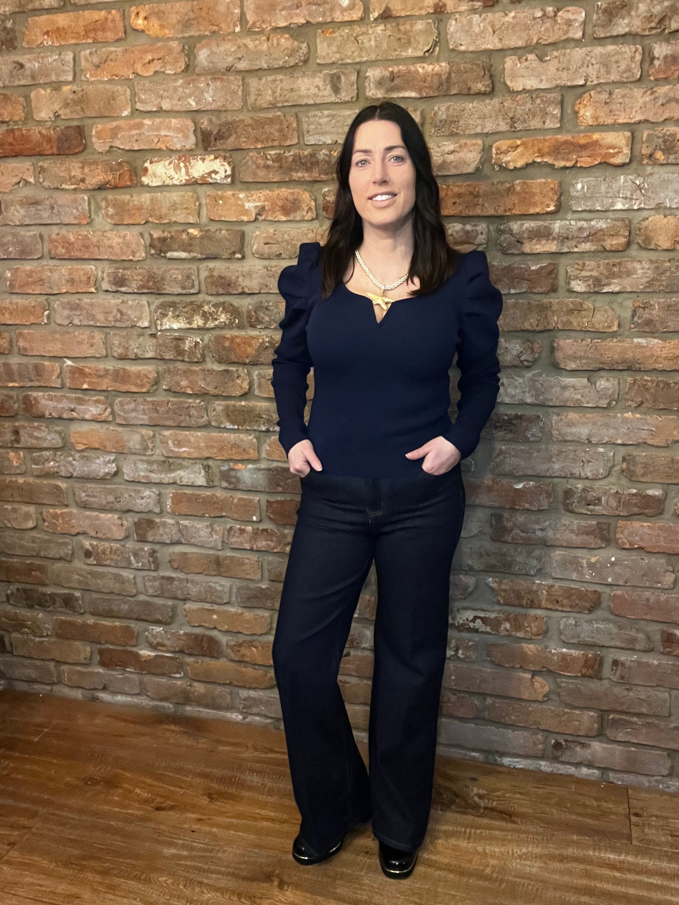 Navy v neckline ruched long sleeved top